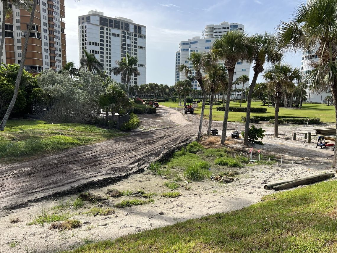Graded sand path through condo grounds