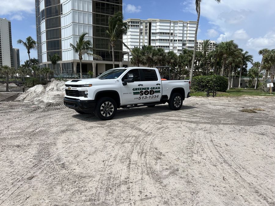 Greener Grass pickup on a graded job site