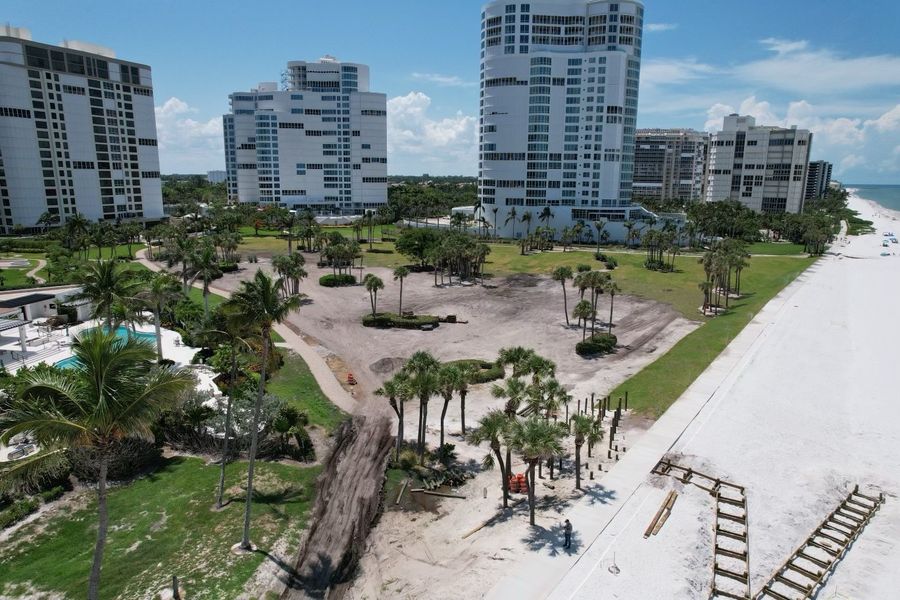 Aerial of condo grounds with sod pallets staged on graded sand